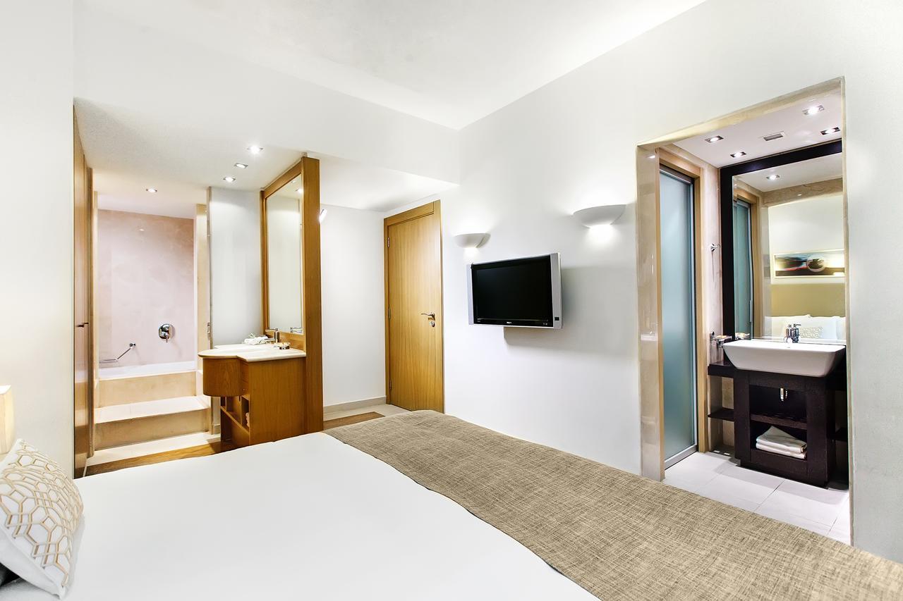 戴奥斯尊享人生酒店 塞萨洛尼基 外观 照片 A typical room at the hotel